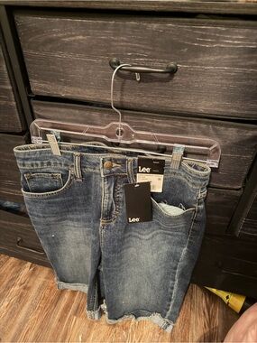 Lee Medium Wash Blue Denim Cutoff Shorts with Frayed Edges